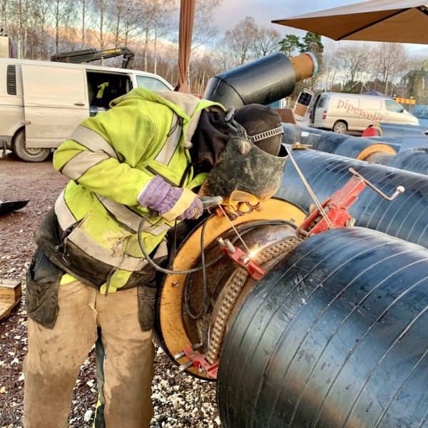 butt welding in process, district heating pipes