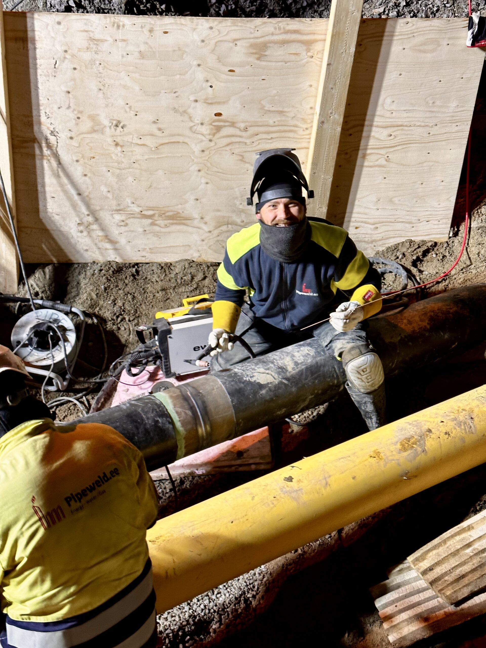 Mechanical Contractor — welder joining an external gas pipeline.