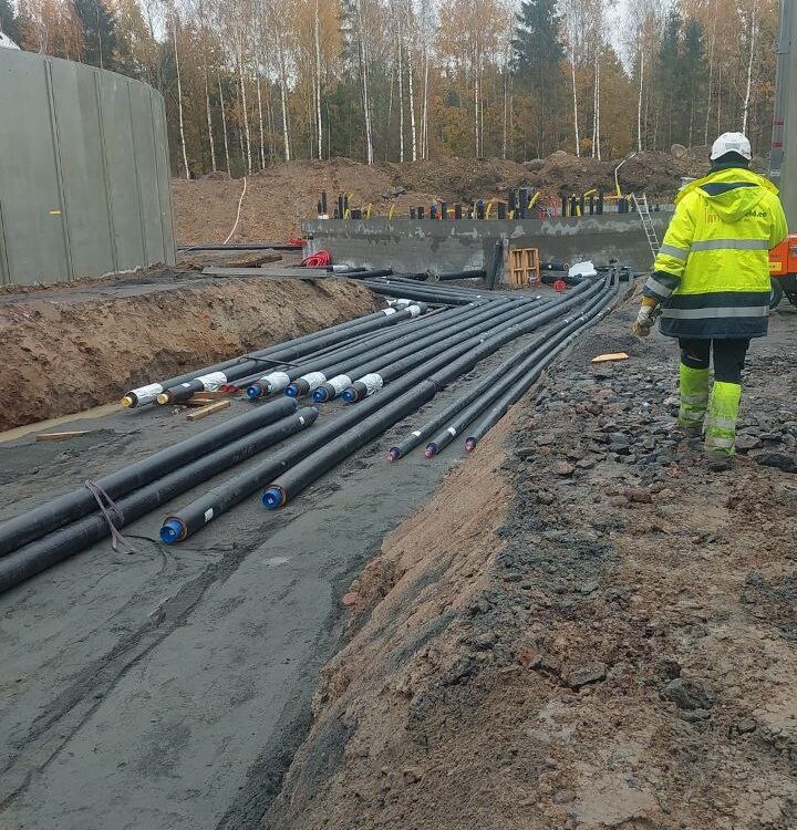 Biogas plant installation – multiple underground pipes exiting tank reservoir
