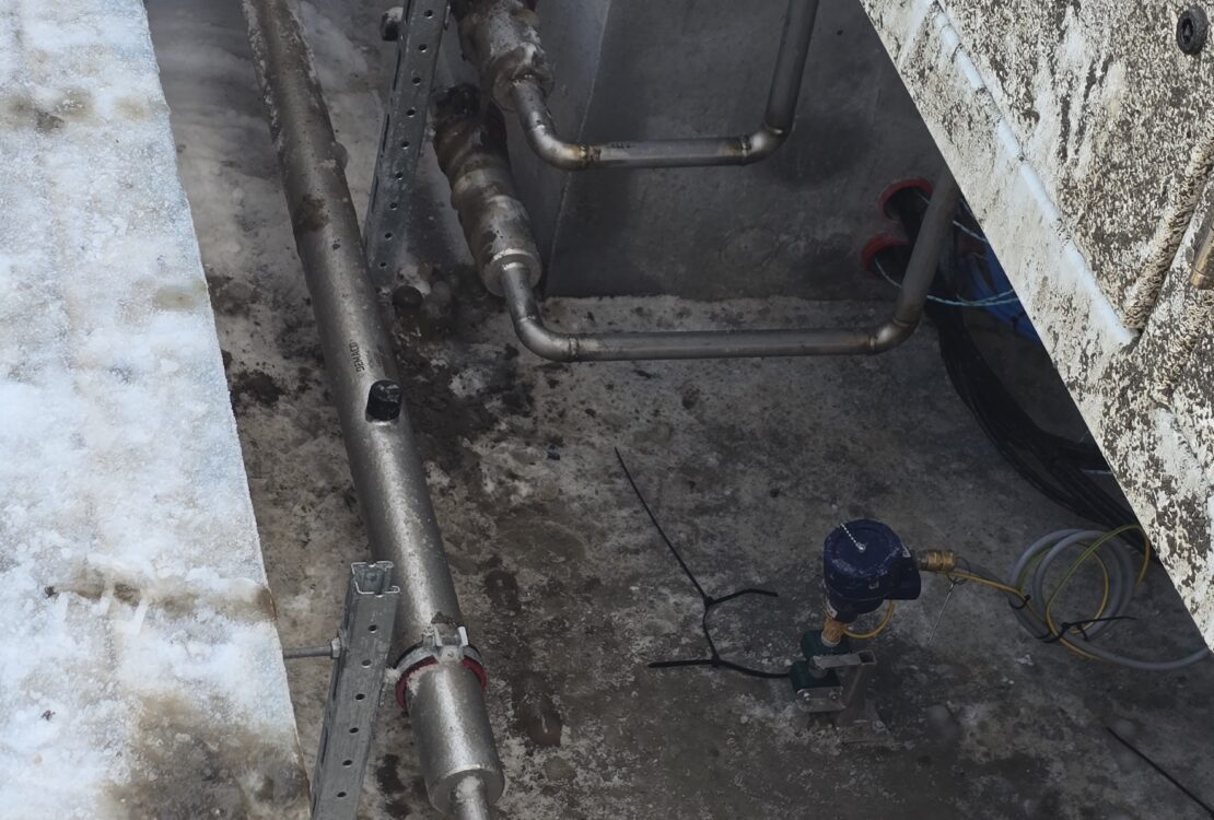 Double pipe-in-pipe underground LPG piping installation in trench under storage tank by welding contractor in Norway